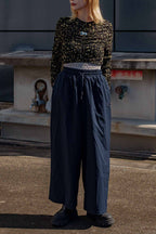 Semon ApartMent AR LOGO NYLON WIDE PANTS