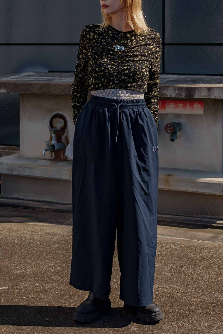 Semon ApartMent AR LOGO NYLON WIDE PANTS