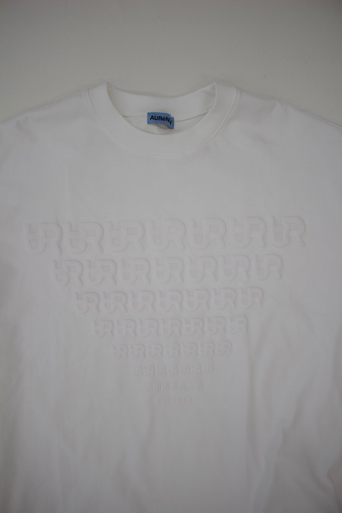 AURéNLEV Cutout Logo Tops ホワイト