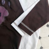 PRINTED RAGLAN ROMPERS 19